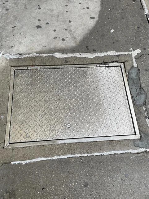 Aluminum dimond-plate overhead cellar door